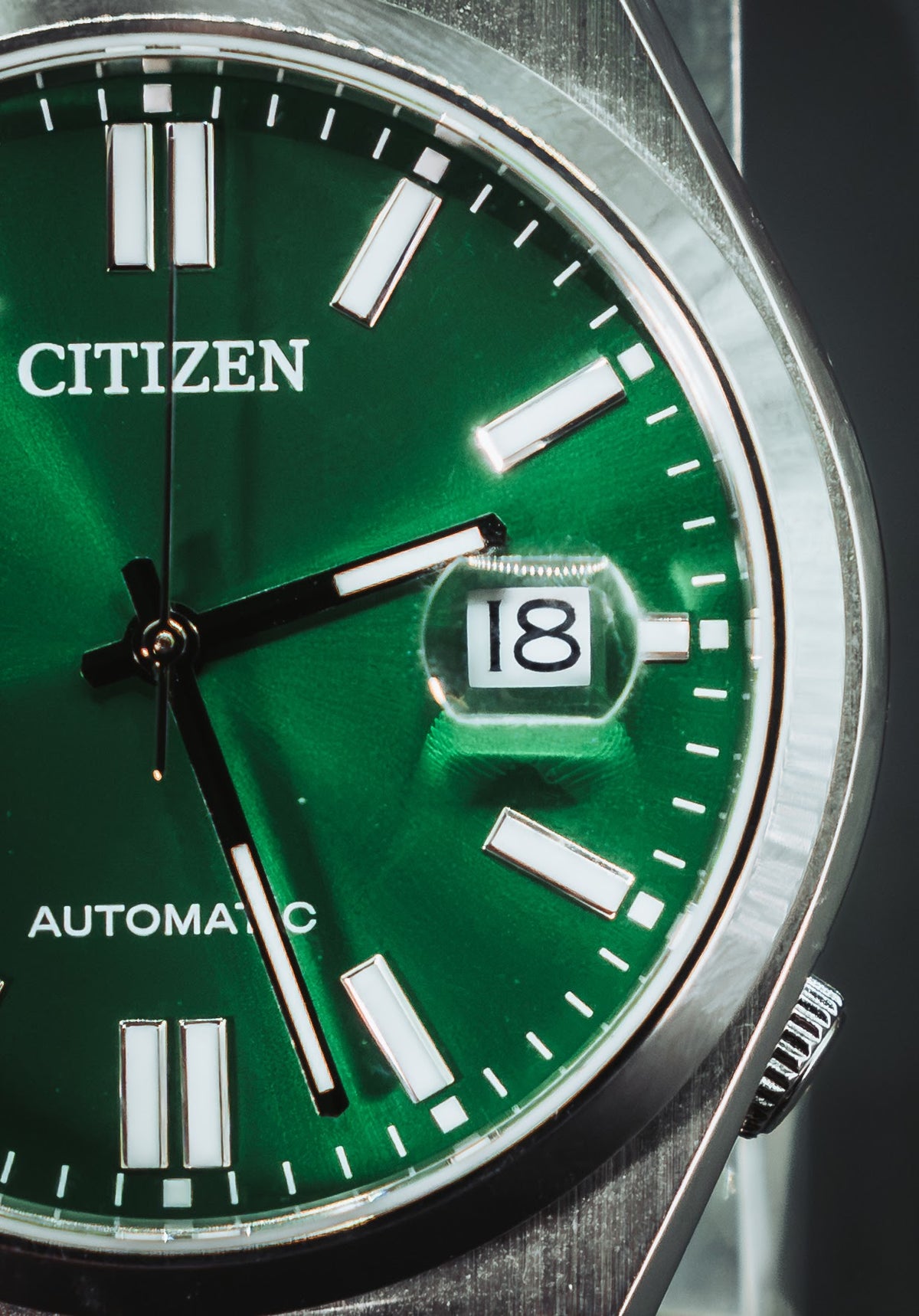 Close-up of the Citizen Automatic green dial and date window