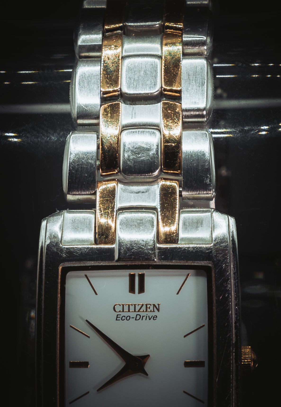 Close-up of the Citizen Eco-Drive dial and two-tone bracelet