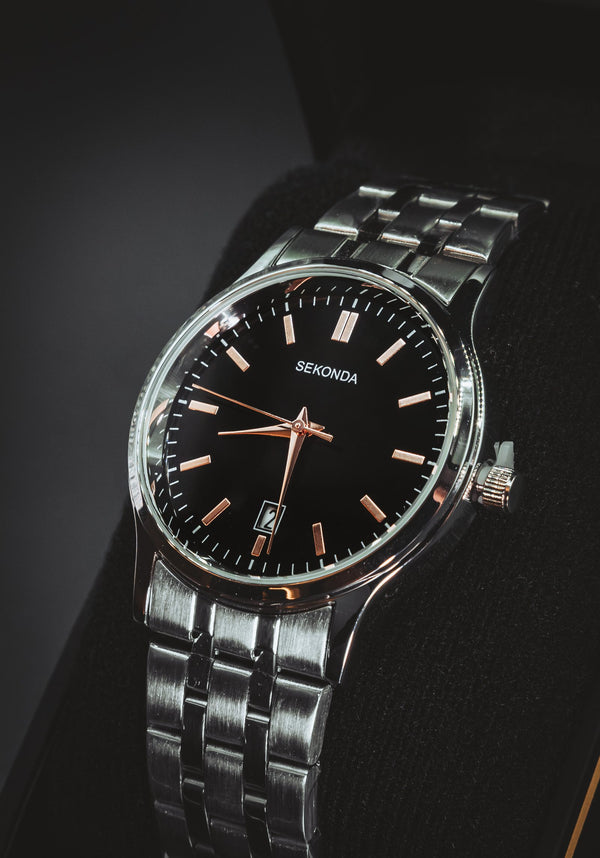 Sekonda with a black dial and rose-gold-tone markers on a steel bracelet