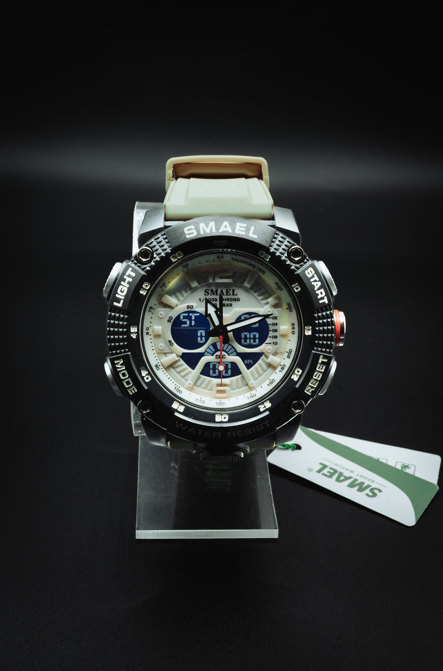 SMAEL sports watch with a white dial and black case on a display stand