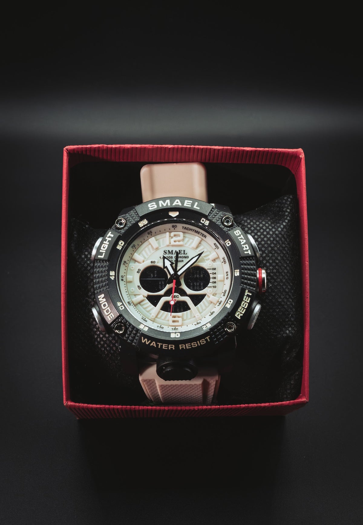 SMAEL sports watch in its red box